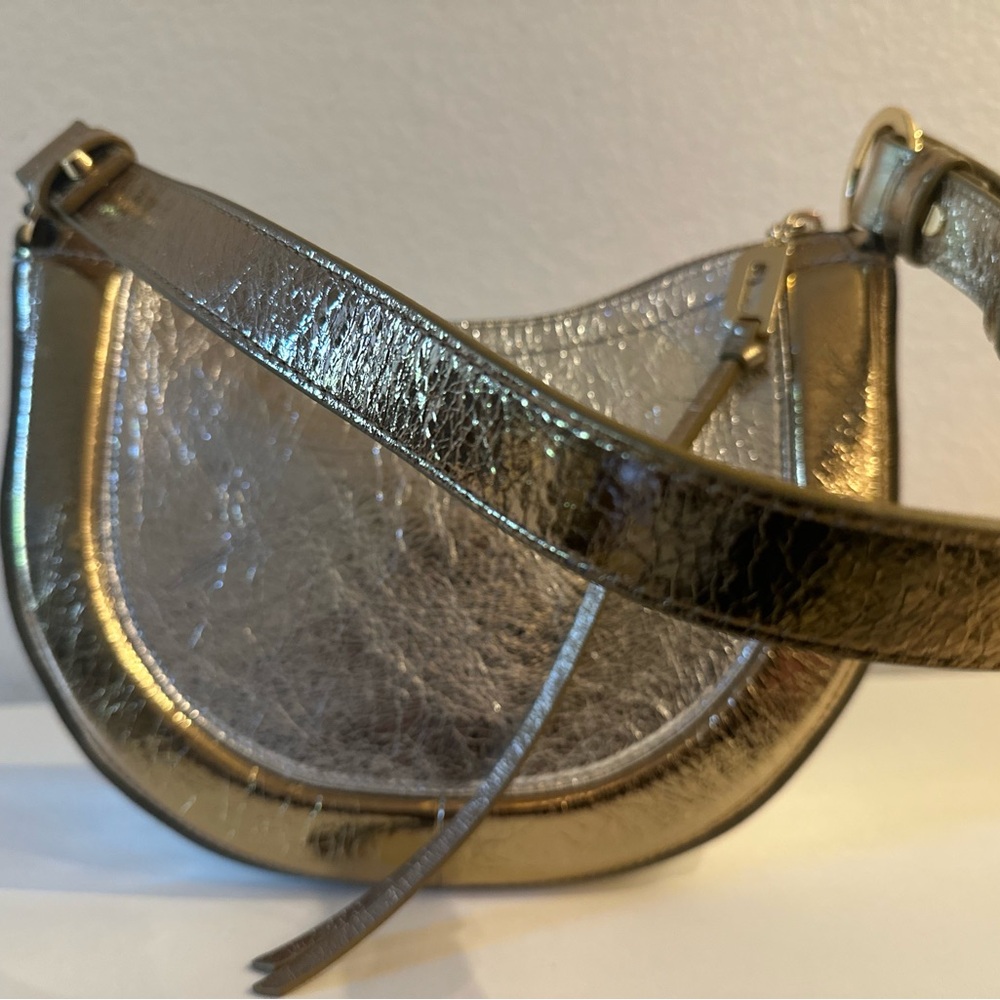 Sold!!Dkny metallic handbag with metallic strap